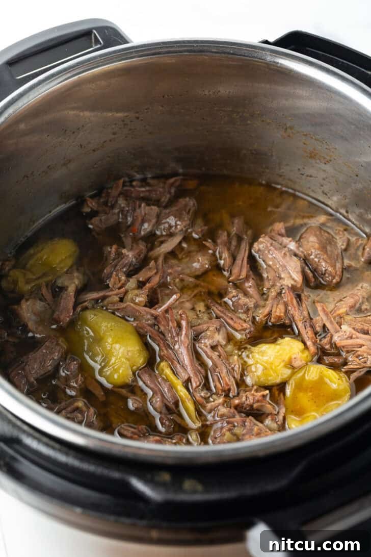Melt-in-Your-Mouth Mississippi Pot Roast 12 Shredded pot roast in an instant pot.