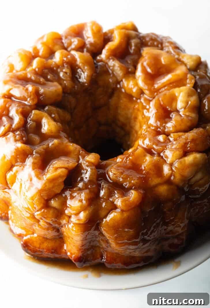 Irresistible Monkey Bread Delight 2 Top down view baked bundt monkey bread with bourbon syrup.