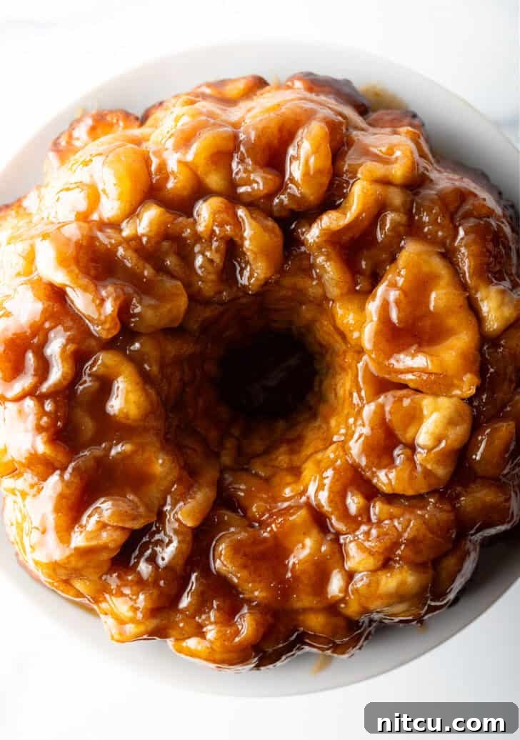 Irresistible Monkey Bread Delight 14 Top down view baked bundt monkey bread with bourbon syrup.