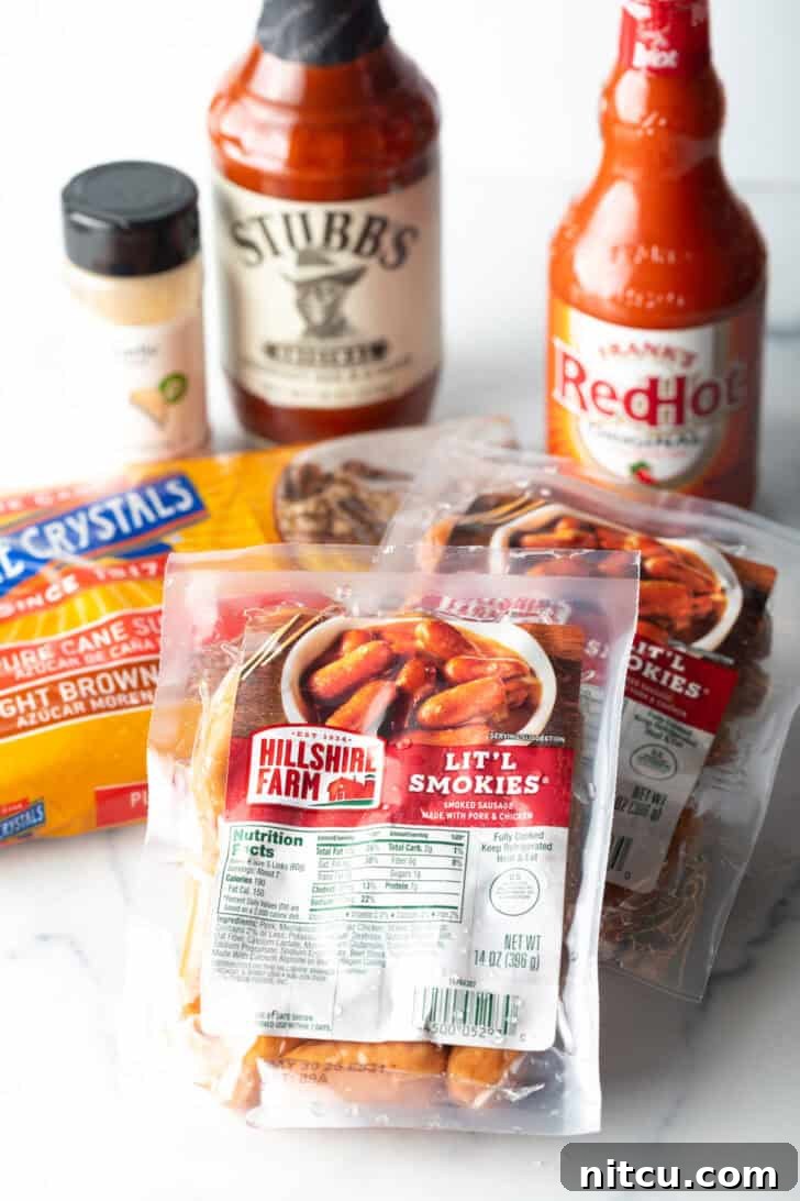 Glazed Cocktail Smokies 5 Recipe ingredients: A bottle of Frank's RedHot, Stubb's bbq sauce, seasoning, two packs of little smokies, and a bag of brown sugar.