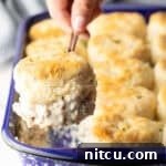 Biscuits and Gravy Casserole lifted out of pan