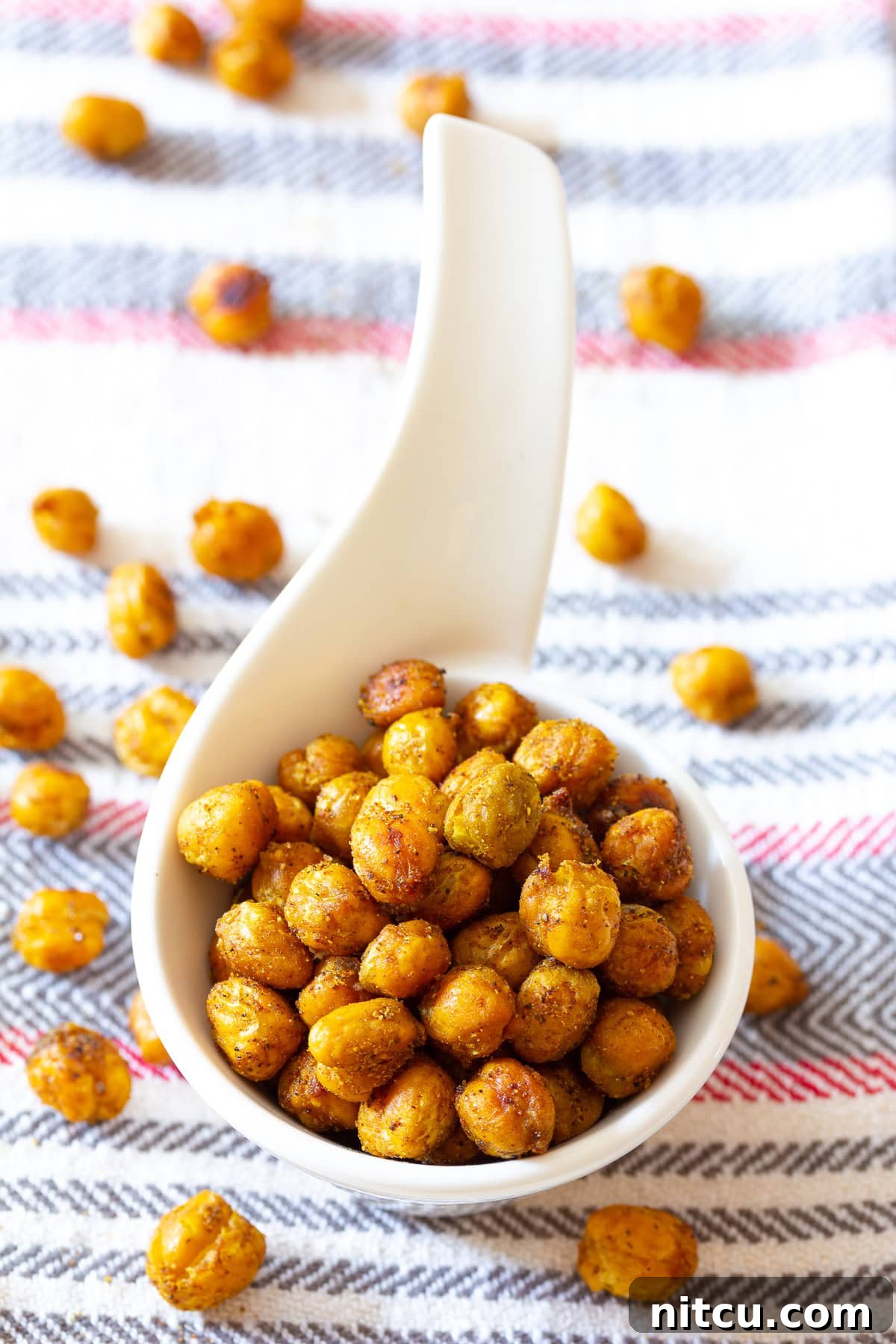 Roasted-Chickpeas Close-up shot of crispy oven-roasted chickpeas seasoned with Indian spices.