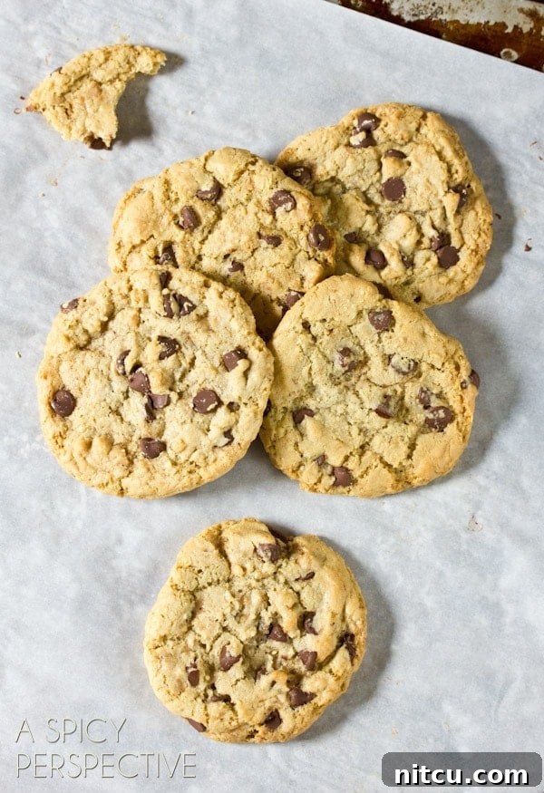 Best Chocolate Chip Cookie Recipe with toffee - overhead shot on tray on convection backed cookies