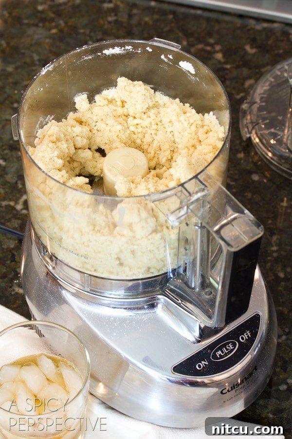 Freshly rolled pie crust in a deep dish pie pan
