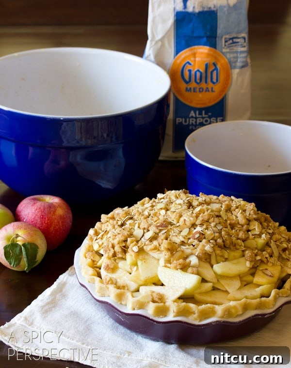 Baked Dutch Apple Pie cooling on a wire rack