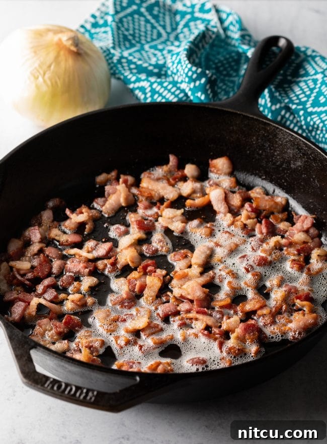 Step-by-step image of making Hungarian Cabbage and Noodles – starting with bacon