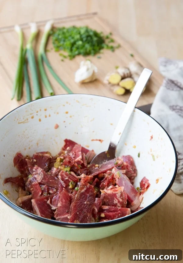 Sizzling Korean BBQ Delights 6 Thin beef slices marinating in a white bowl.