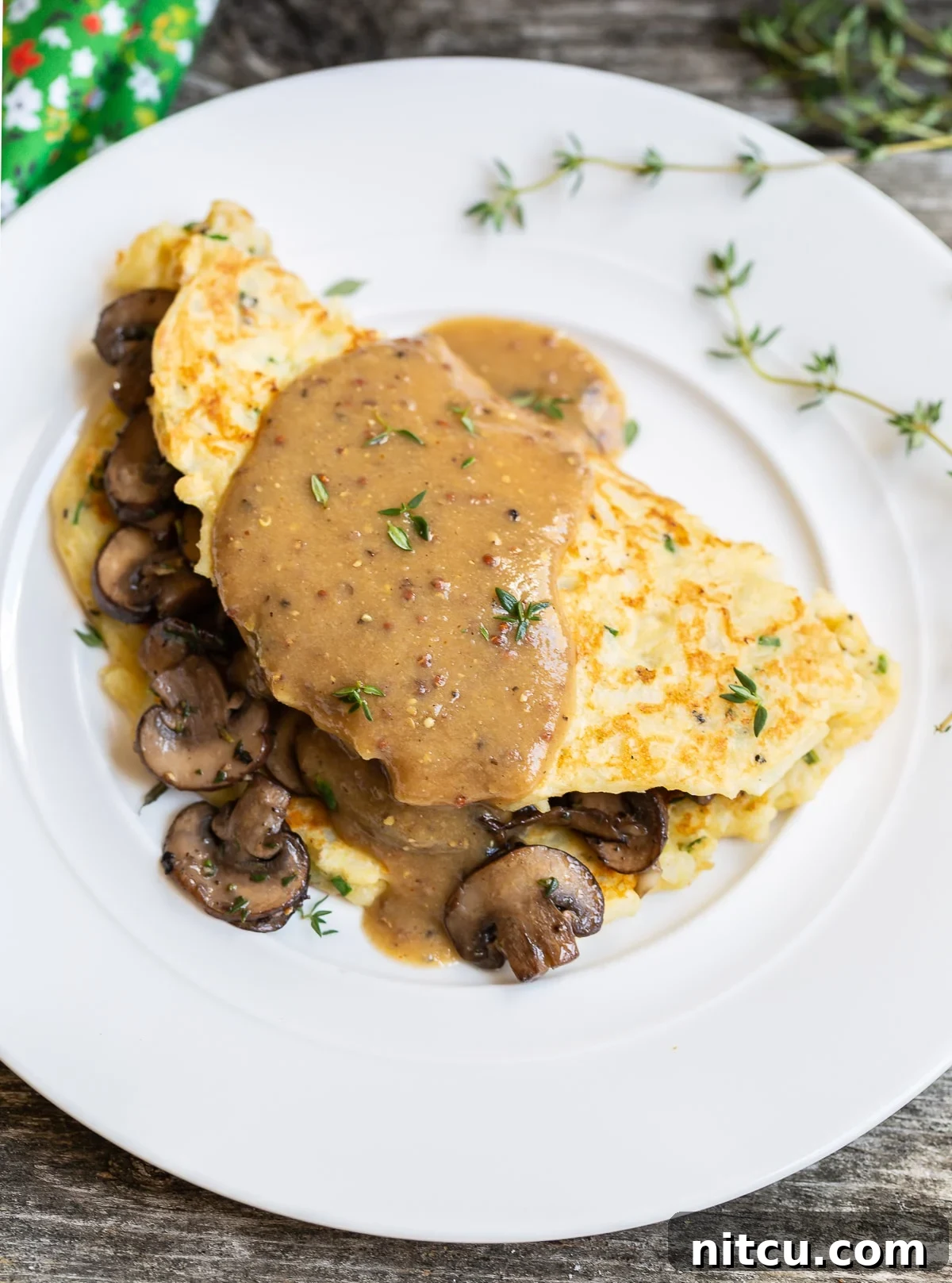 Classic Irish Boxty: A Potato Pancake Tradition 2 Traditional Irish Boxty Potato Pancakes with Sautéed Mushrooms and Whiskey Gravy for Saint Patrick's Day