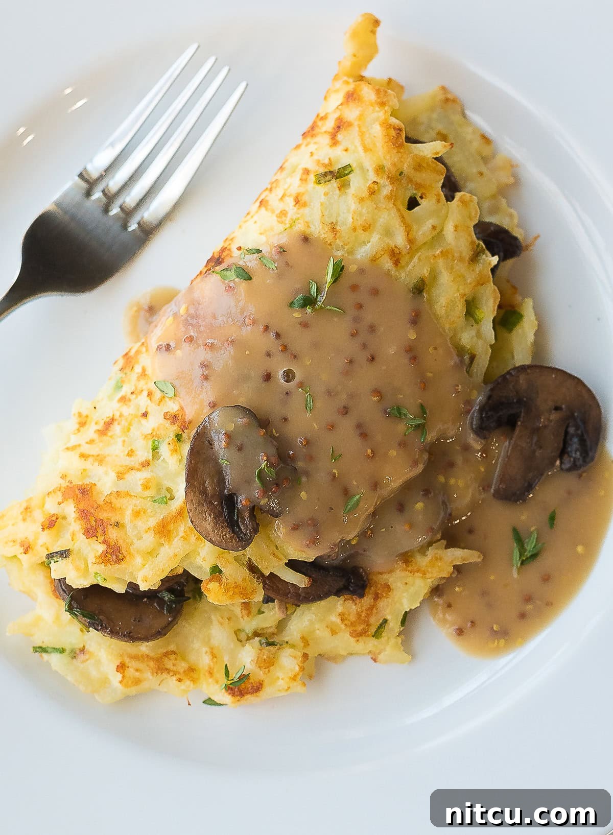 Classic Irish Boxty: A Potato Pancake Tradition 3 Step-by-Step Guide to Making Irish Potato Pancakes with Earthy Mushrooms and Flavorful Whiskey Gravy