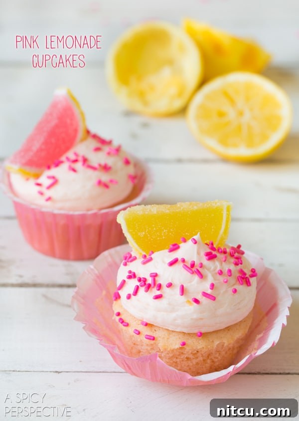 Simple Pink Lemonade Cupcakes, beautifully decorated and bursting with flavor. #lemon #lemonade #cupcakes #pink #kitchenconvo