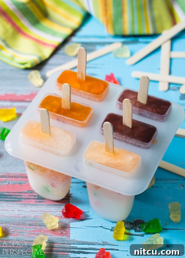 How to Make Kid-Friendly Gummy Bear Popsicles Making Gummy Bear Popsicles with various sodas