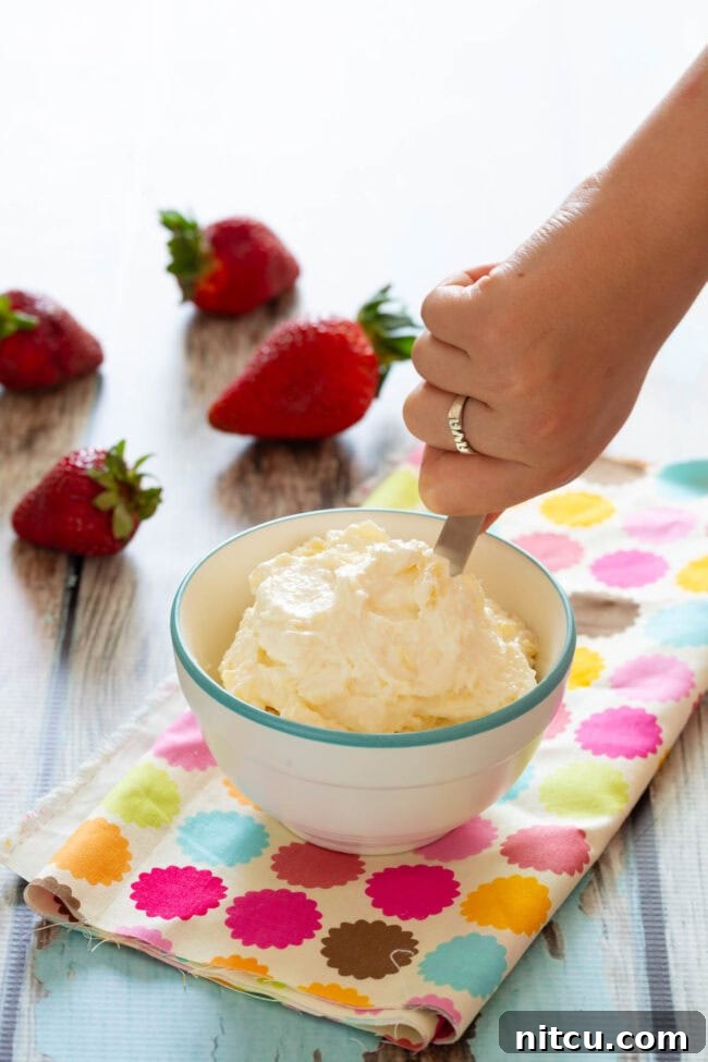 Sweet Start Fruit Pizza 4 Kid-Friendly Fruit Pizza for Breakfast featuring a creamy white spread, ready for fruit toppings.