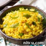 Featured image of the Indian Rice recipe, showing a delicious serving in a bowl.