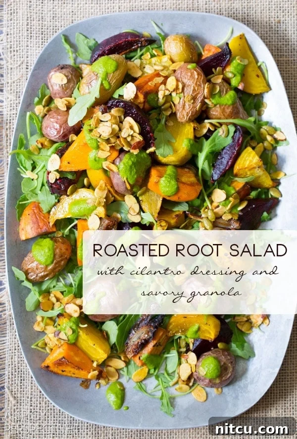Golden Roasted Root Medley 2 Roasted Root Vegetables Salad topped with granola and cilantro dressing on a serving platter.