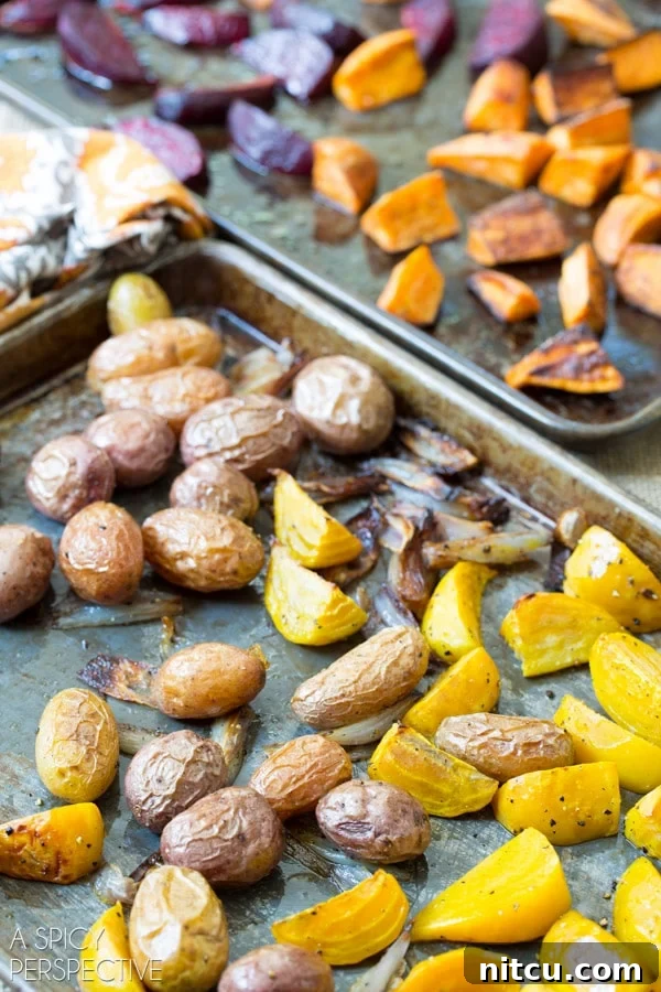 Golden Roasted Root Medley 4 Roasted root vegetables on baking sheets.