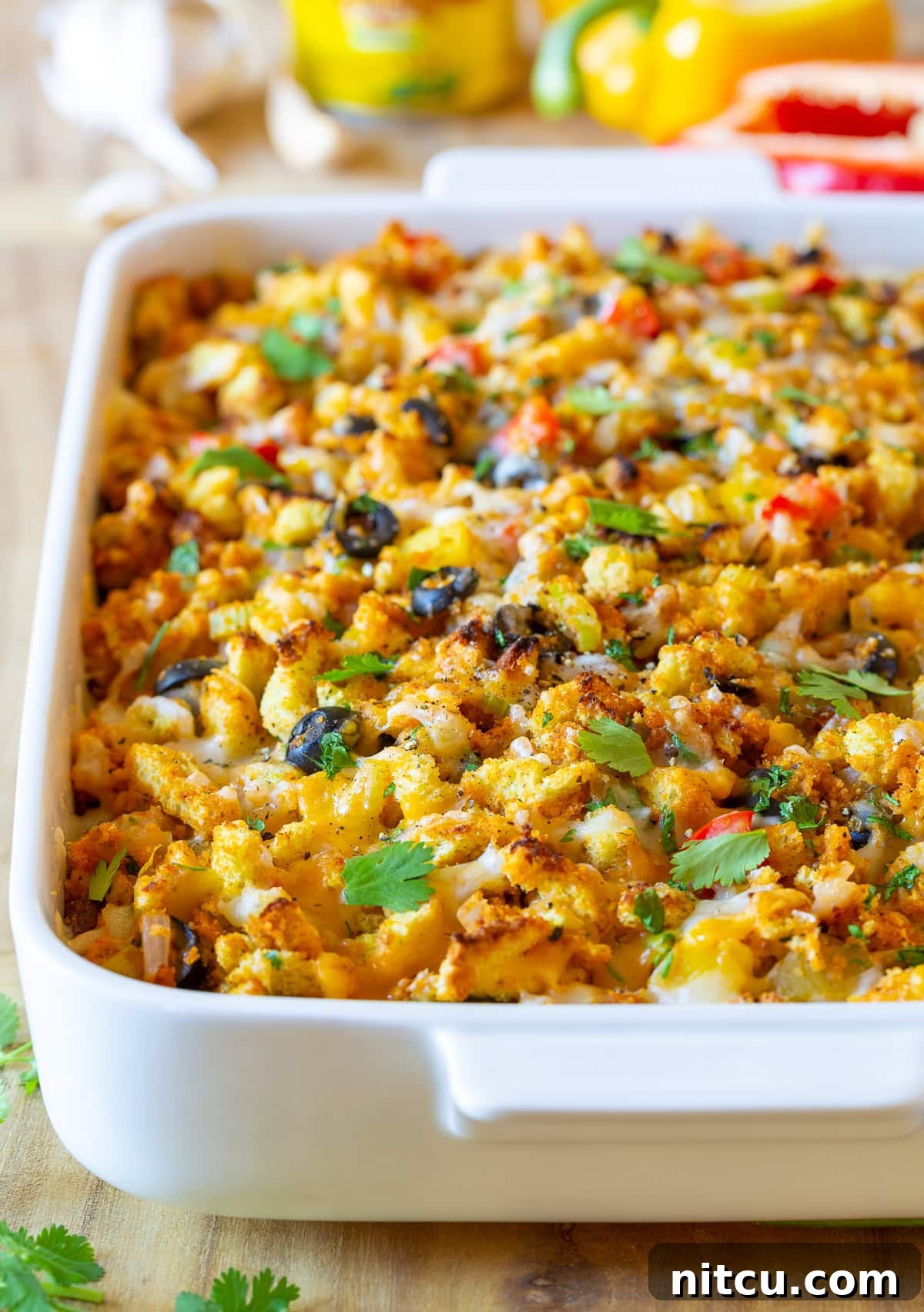 Mexican Thanksgiving Cornbread Stuffing Mexican Thanksgiving Cornbread Stuffing Recipe in a festive baking dish, ready to be served