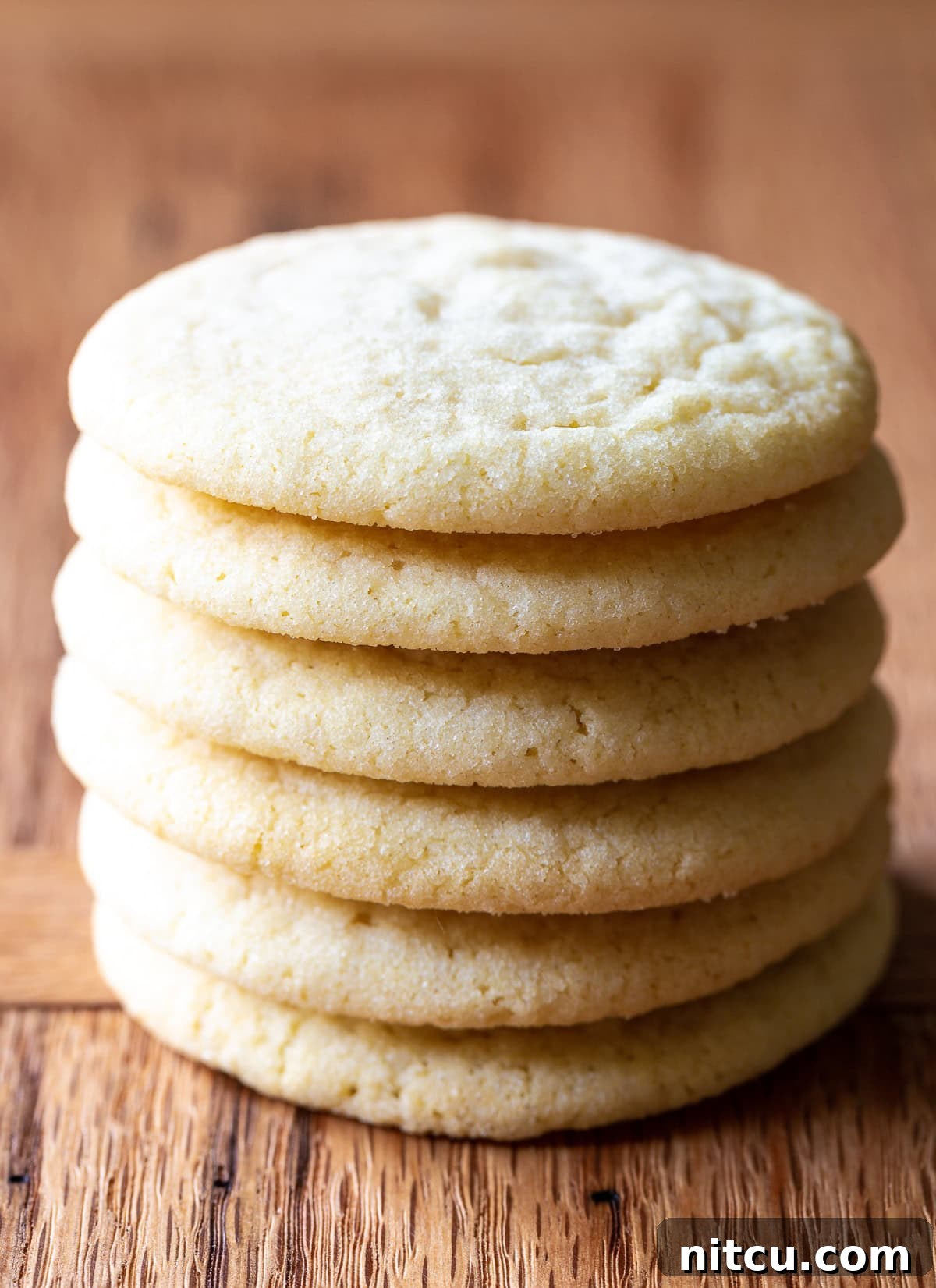 Simply Irresistible Sugar Cookies 2 Side view of a stack of the best sugar cookie recipe, showcasing their perfect texture and golden edges.