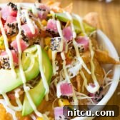 Aloha Ahi Poke Nachos 14 Ahi Wonton Nachos with Wasabi Mayo and Fresh Mango Pico de Gallo on ASpicyPerspective.com #nachos