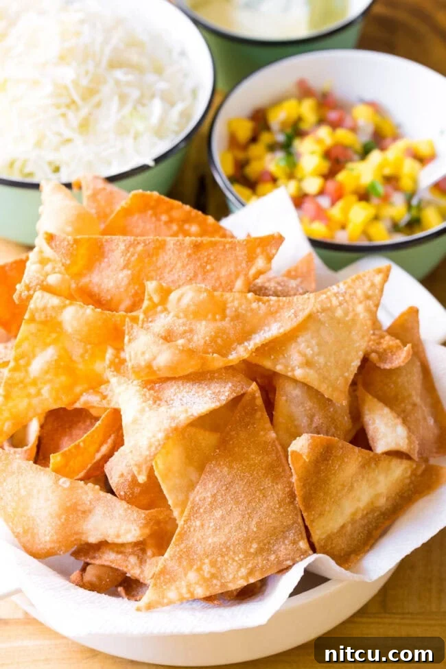Aloha Ahi Poke Nachos 5 Crispy fried wonton chips in a bowl.