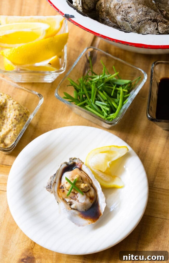 Mastering the Oyster Shuck 18 Oysters with balsamic vinegar and chives