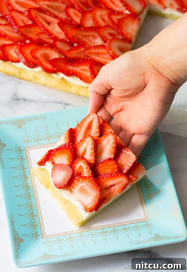 Strawberry Pizza, Fresh Strawberries, Fruit Dessert Close-up of freshly sliced strawberries on the dessert pizza.
