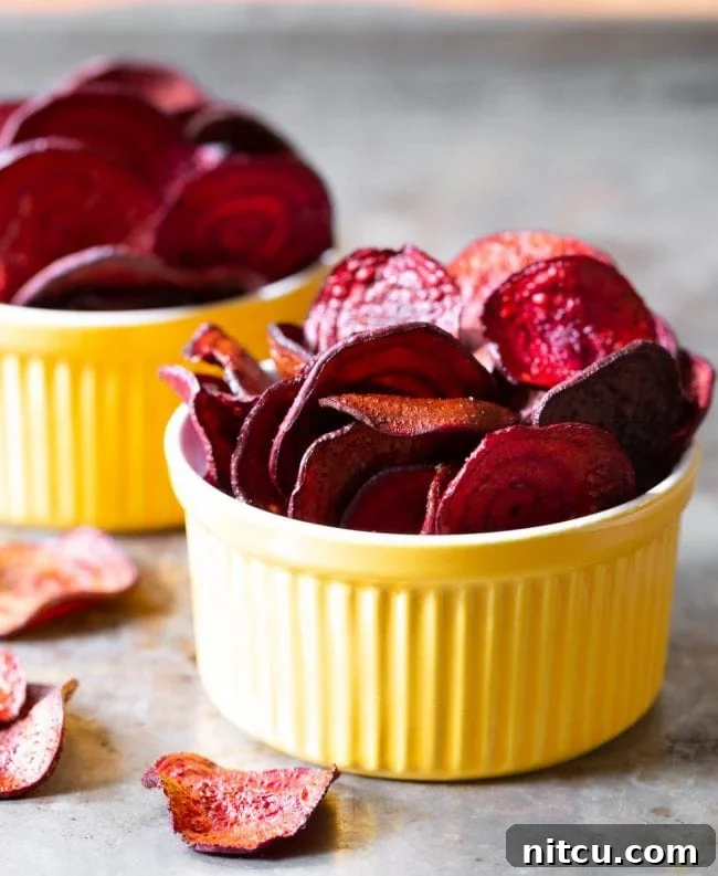 Wholesome Beet Crisps 8 Final beet chips recipe looking crispy and bright in yellow bowls.