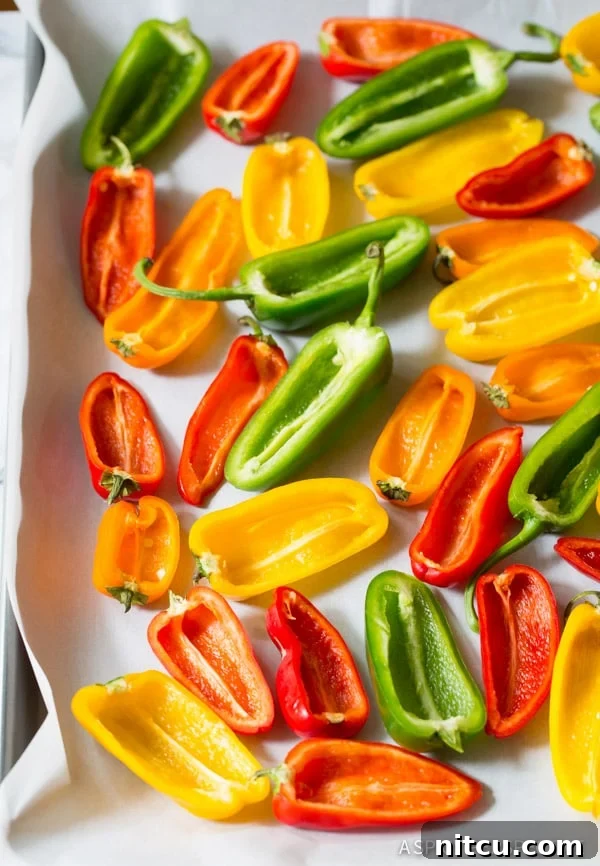 Mini Pepper Poppers 5 How to Make 3-Ingredient Mini Stuffed Peppers Recipe on ASpicyPerspective.com - So good!