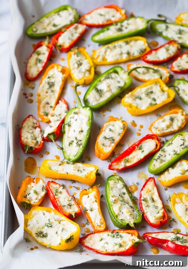 Mini Pepper Poppers 7 Awesome 3-Ingredient Mini Stuffed Peppers Recipe on ASpicyPerspective.com - So good!