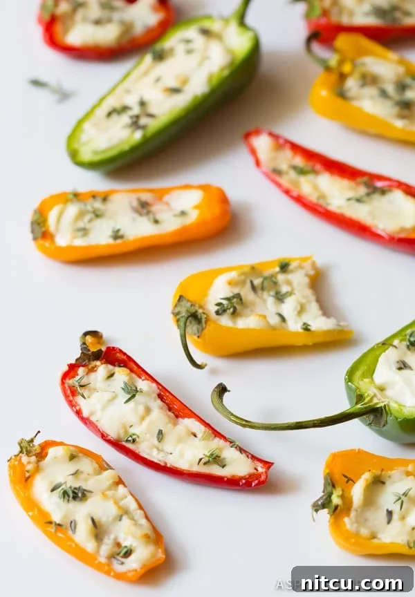 Mini Pepper Poppers 8 3-Ingredient Stuffed Mini Peppers - close up shot with herbs