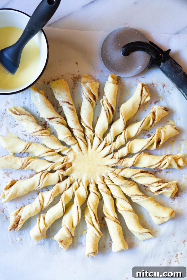 Flaky Pull-Apart Puff Pastry 9 Twist the strips and lay in a sun pattern
