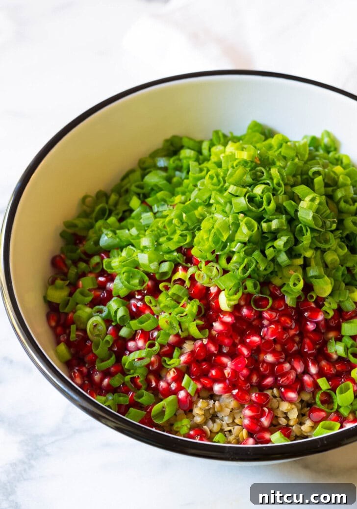 Wholesome Lentil Salad with Tangy Apple Dressing 4 Ingredients for lentil salad in a bowl before being mixed.