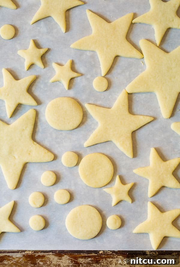 How to Make 3D Christmas Cookies - cut out cookies on baking sheet
