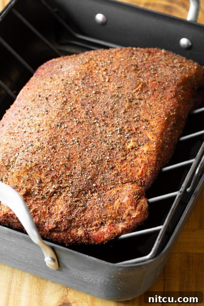 Perfect Oven Brisket 4 oven brisket recipe - beef brisket with dry rub in roasting pan