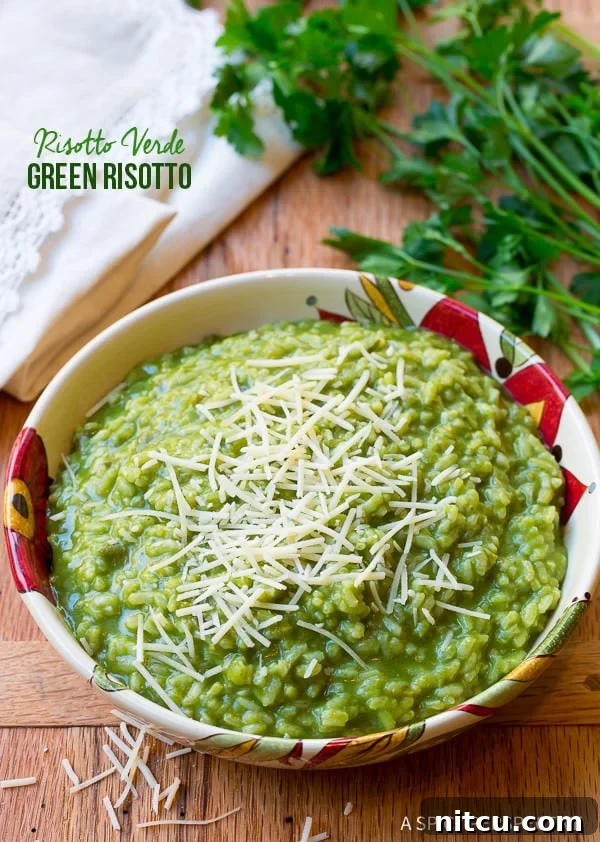 Creamy Spinach Risotto 3 Spinach risotto served in a bowl.