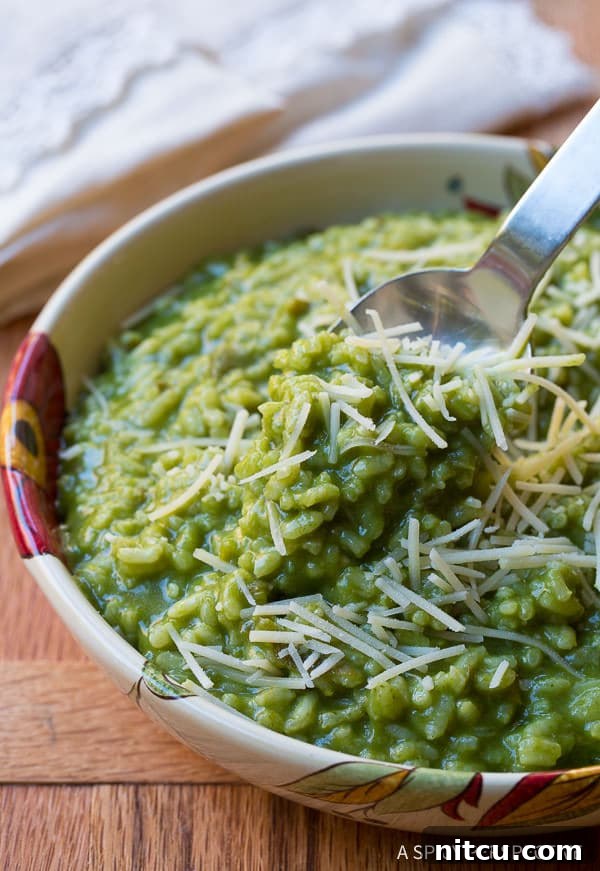 Creamy Spinach Risotto 8 Taking a spoonful of green garlic parmesan risotto.