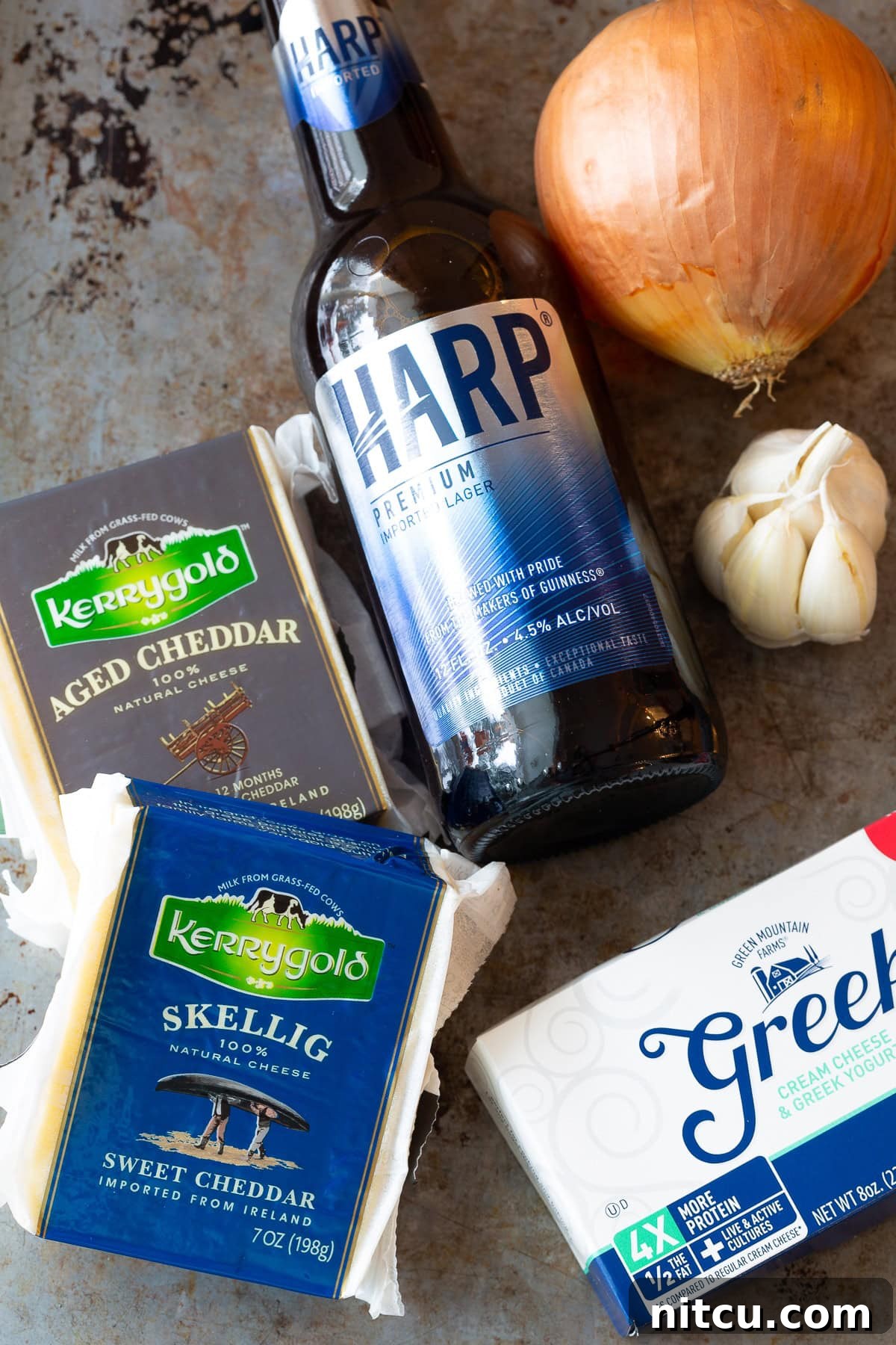 Key ingredients laid out for making creamy Irish Beer Cheese Soup.