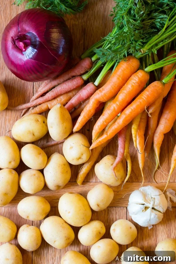 Melt-in-Your-Mouth Slow Cooker Pork Loin and Root Veggies 4 Fresh vegetables and baby potatoes ready for Crock Pot Pork Loin with Vegetables