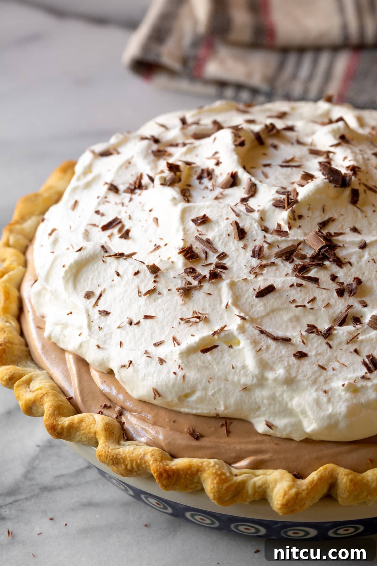 Velvety French Silk Pie 6 Close-up of the finished French Silk Pie, beautifully garnished with delicate chocolate shavings.