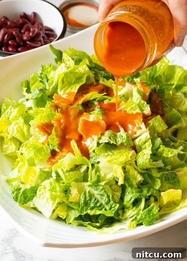 Legendary Dorito Taco Salad 7 A bowl of seasoned ground beef, cooked and ready for assembly.