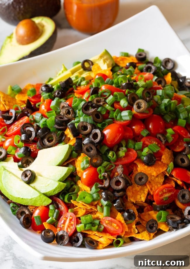 Legendary Dorito Taco Salad 10 A prepared bowl of creamy sour cream mixed with ranch dip mix.