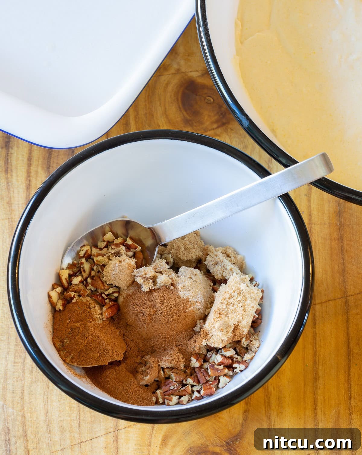 Decadent Kahlua Coffee Cake 4 Sour Cream Coffee Cake ingredients in a small mixing bowl, showing the texture of the crumble mix