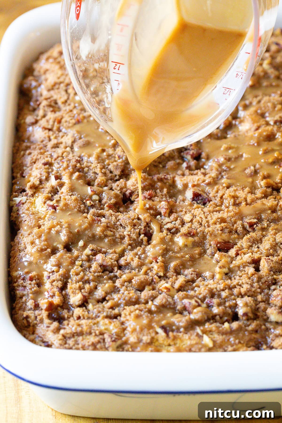 Decadent Kahlua Coffee Cake 6 Easy Coffee Cake Recipe with kahlua drizzle over the crumble top, a close-up of the delicious glaze