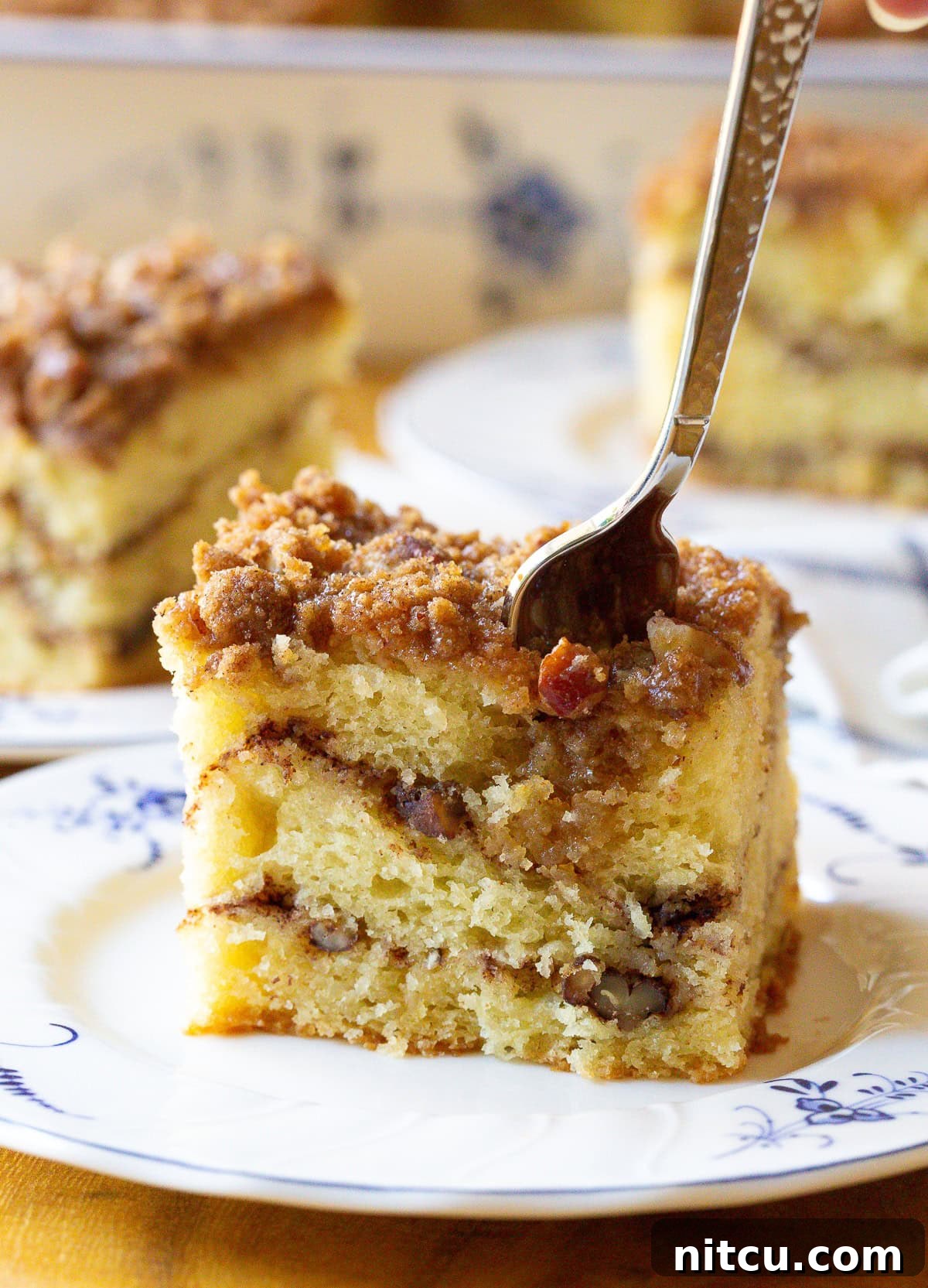 Decadent Kahlua Coffee Cake 9 Easy Kahlua Coffee Cake side angle view of cake, highlighting its moist interior and crumble.