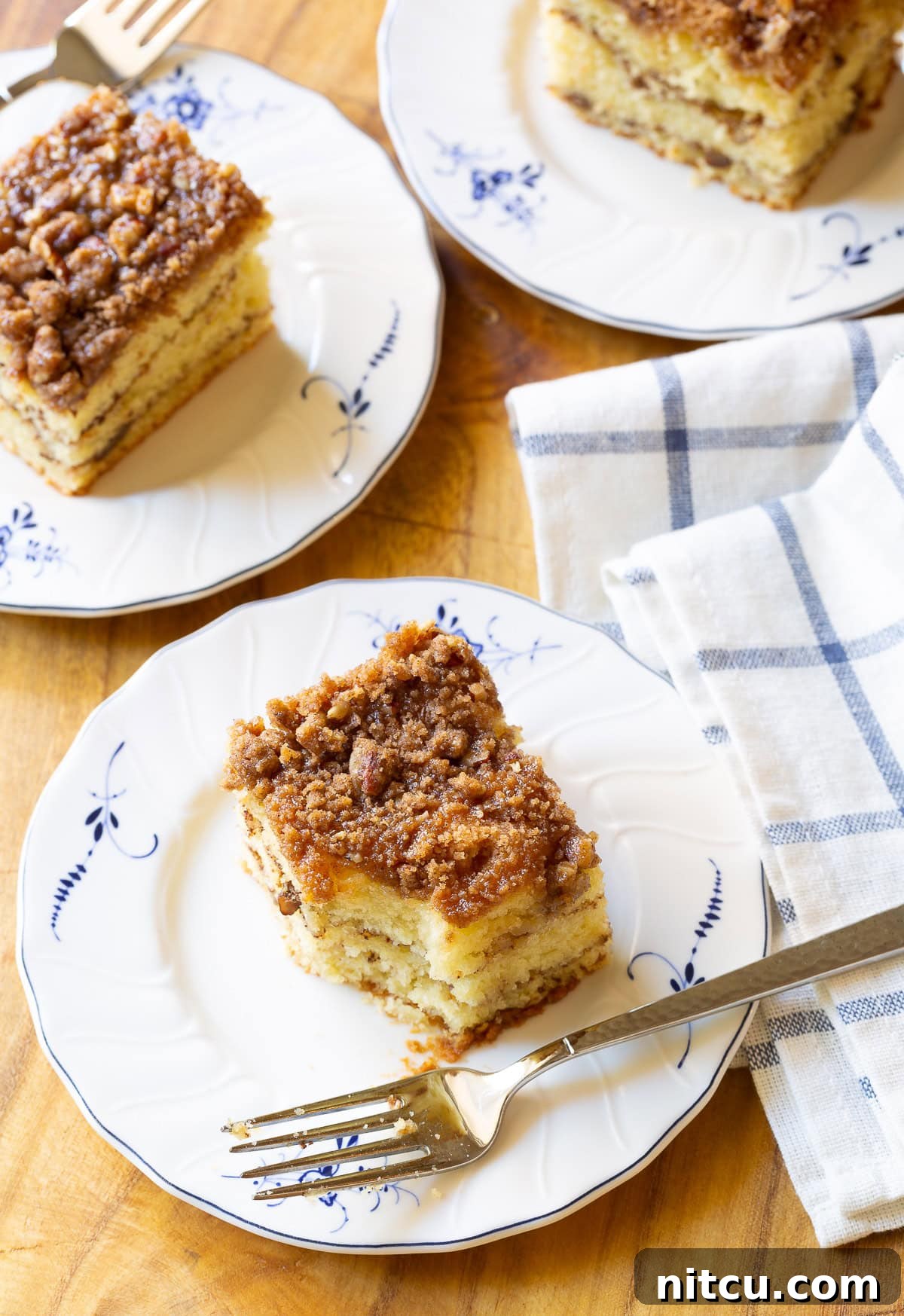Decadent Kahlua Coffee Cake 10 Kahlua Coffee Cake on plate with bite taken out, showing the rich texture.