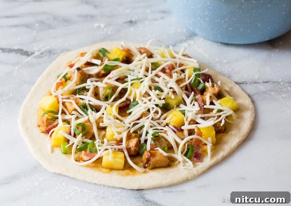 Umami Grilled Teriyaki Chicken Pizza 9 Make the Best Grilled Chicken Teriyaki Pizza as it cooks on the grill stone.