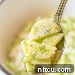 A small image of the Creamy Cucumber Salad with dill, ready to be served and enjoyed.