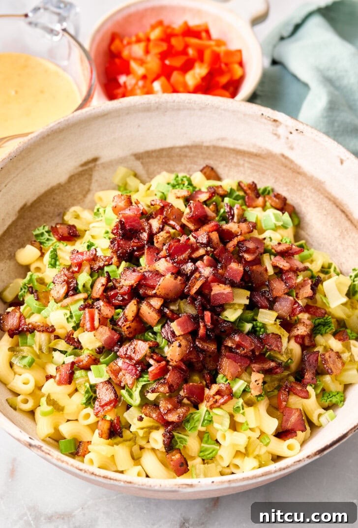 Irresistible Macaroni Salad 6 macaroni salad ingredients in bowl