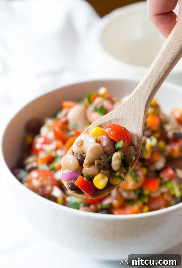 Fifteen Bean Fiesta 10 Zesty 15 Bean Salad Recipe: A tangy and refreshing salad with a kick.