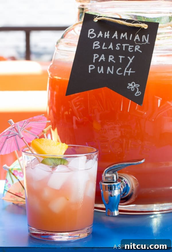 Bahamian Party Punch served with umbrella Rum Punch in glass with paper umbrella, ready for a party