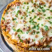 Baked Spaghetti Pie Recipe | ASpicyPerspective.com #retro